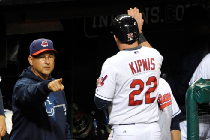 Sep 25, 2013; Cleveland, OH, USA; Cleveland Indians second baseman Jason Kipnis (22) is congratulated by manager Terry Francona after scoring in the seventh inning against the Chicago White Sox at Progressive Field. Mandatory Credit: David Richard-USA TODAY Sports